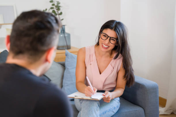 Mental Health Technician providing support during a counseling session